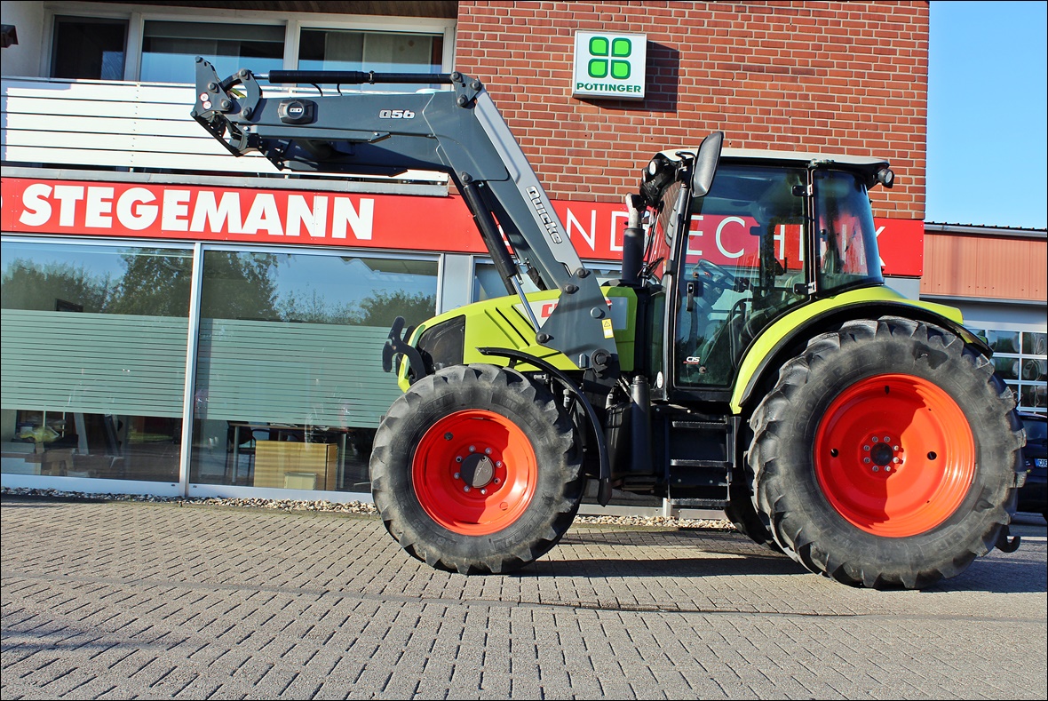Claas Arion 410 CIS mit  Frontlader QUICKE Q 56